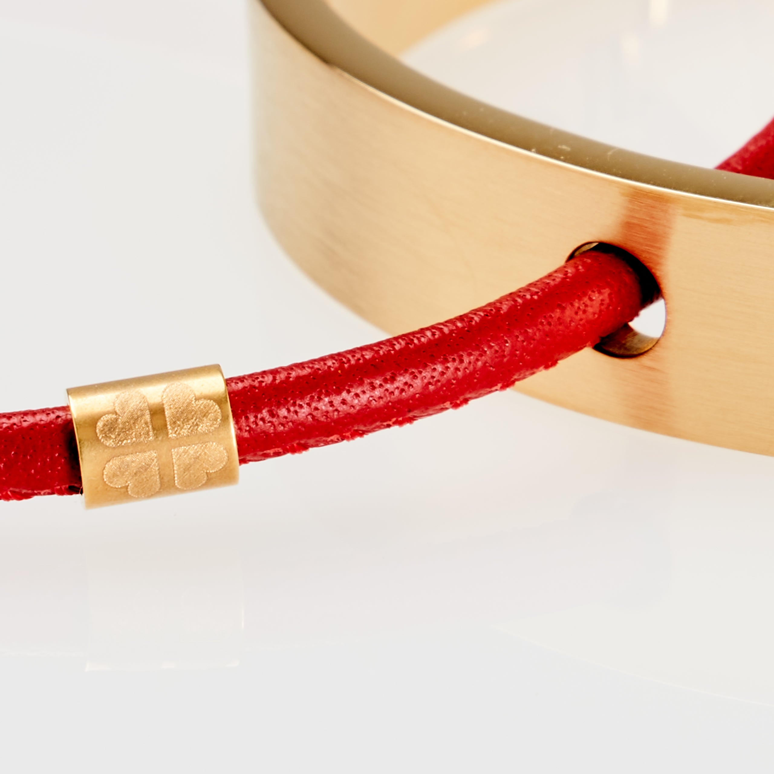 ONE WORLD Armreif gold gelasert